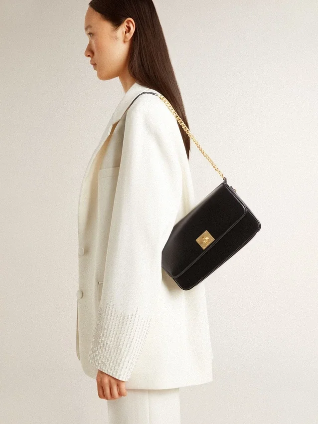 Sac Gioia en cuir noir rigide avec détails dorés