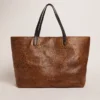 Sac Pasadena en cuir martelé à imprimé léopard et anses noires contrastantes