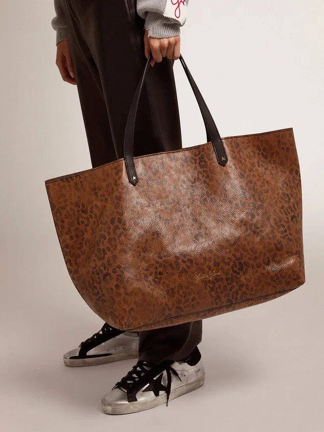Sac Pasadena en cuir martelé à imprimé léopard et anses noires contrastantes