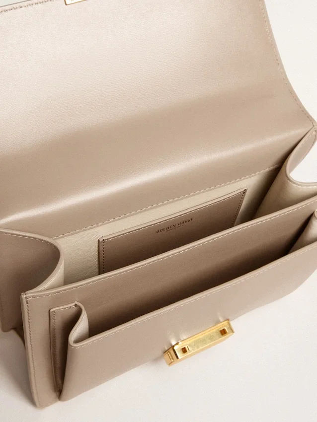 Sac Venezia en cuir beige à nervures avec détails dorés