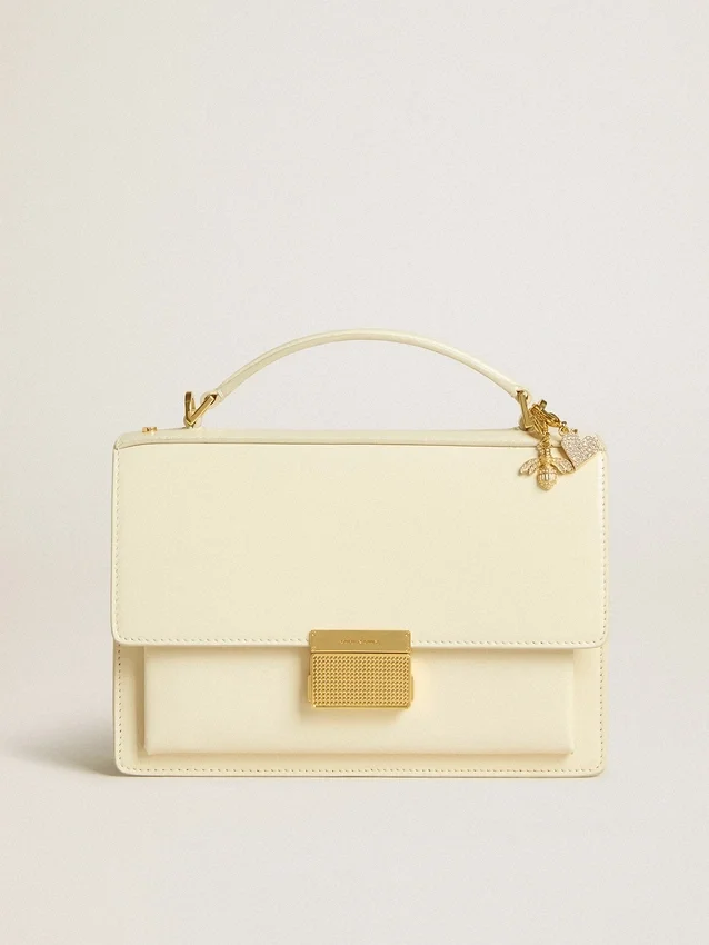 Sac Venezia en cuir gaufré couleur beurre avec double breloque