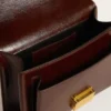 Sac Venezia en cuir laminé marron foncé avec détails dorés