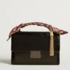 Sac Venezia en cuir métallisé noir avec détails noirs