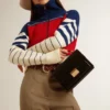 Sac Venezia en cuir noir gaufré avec détails dorés