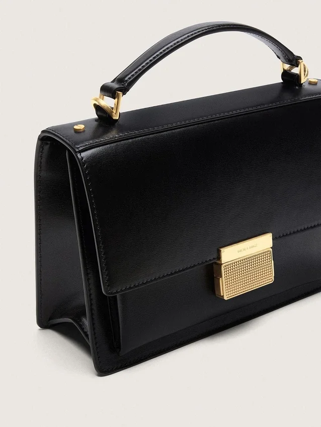 Sac Venezia en cuir noir gaufré avec détails dorés