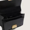 Sac Venezia en cuir noir gaufré avec détails dorés