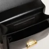 Sac Venezia en cuir noir gaufré avec détails dorés