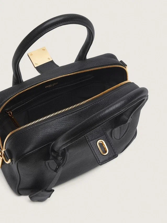 Sac Vita en cuir de mouton noir avec détails dorés