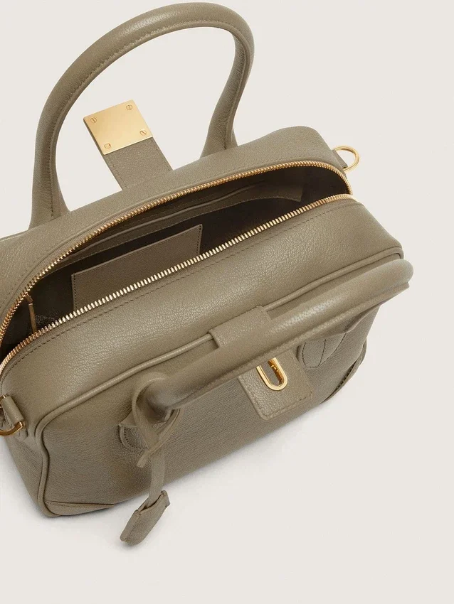 Sac Vita en cuir vert sauge avec détails dorés