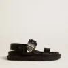 Sandales Lucy pour femme en cuir noir brillant avec boucle en métal doré