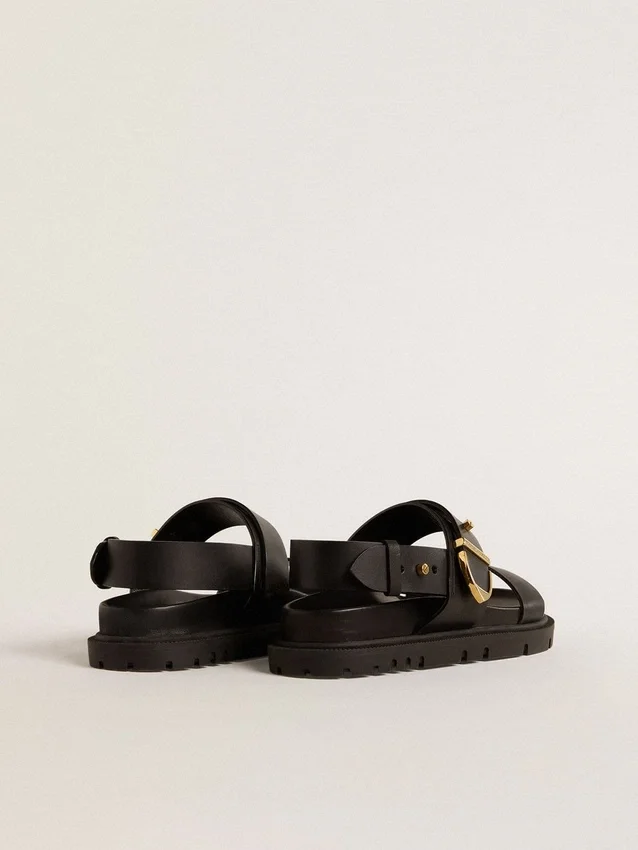 Sandales Lucy pour femme en cuir noir brillant avec boucle en métal doré