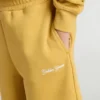Short de jogging pour enfant jaune ocre avec broderie