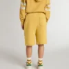 Short de jogging pour enfant jaune ocre avec broderie