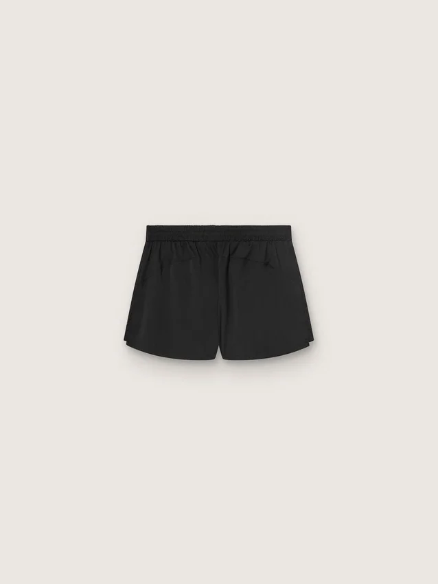 Short de sport noir à double épaisseur pour femme
