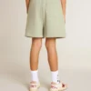 Short vert clair avec une étoile blanche