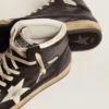 Sky-Star en cuir nappa noir avec une étoile en cuir blanc