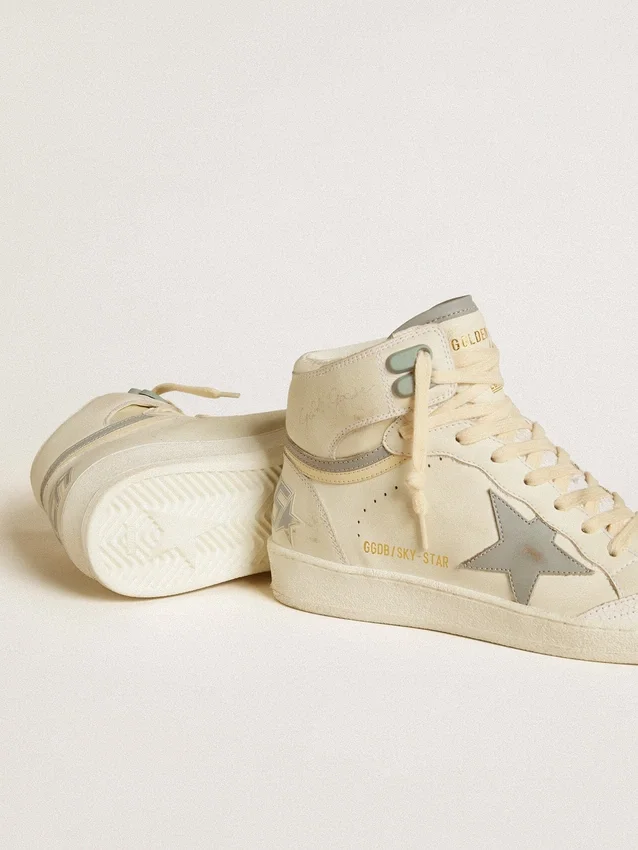 Sky-Star pour femme en cuir avec étoile en cuir bleu clair et languette de talon blanche
