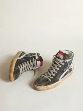 Slide en denim bleu nuit ornée d’une étoile en cuir blanc