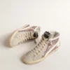 Slide pailletée lilas avec étoile en cuir blanc et reflets