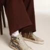 Slide pour femme en cuir de poney imprimé léopard avec étoile en cuir argenté