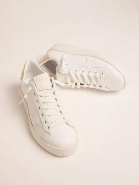 Sneakers Purestar pour femme avec languette de talon dorée