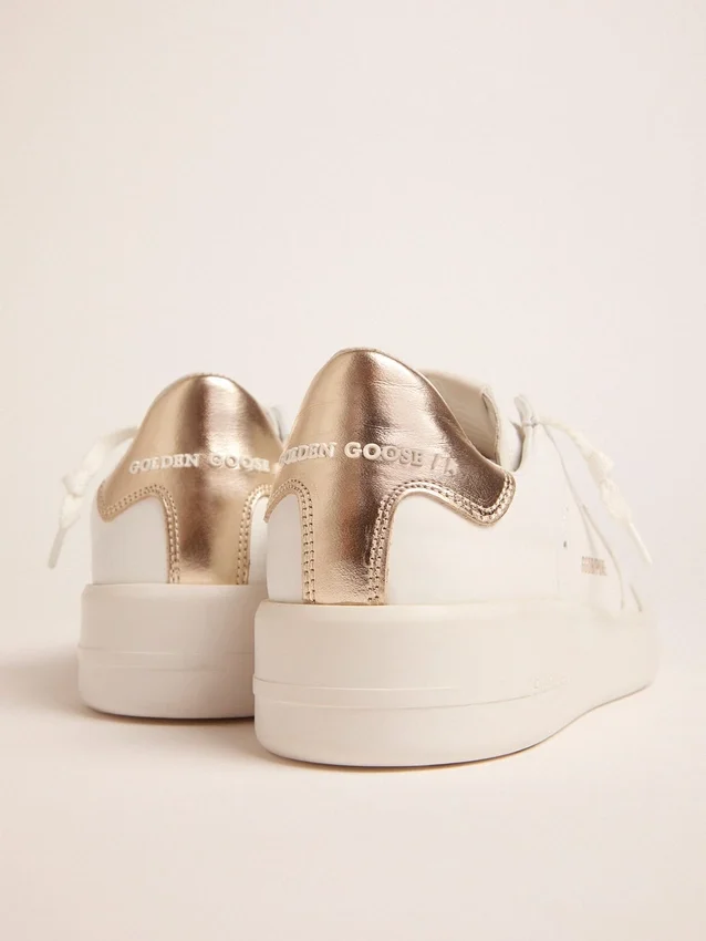 Sneakers Purestar pour femme avec languette de talon dorée