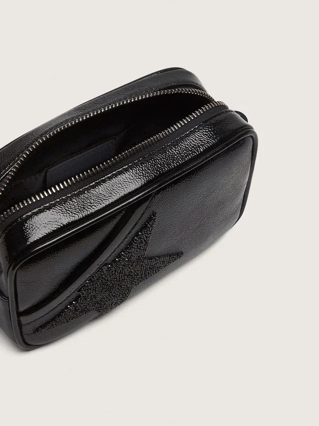Star Bag en cuir noir orné d’une étoile en cristal Swarovski