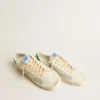Stardan en cuir nappa blanc avec une étoile en cuir couleur crème