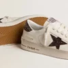 Stardan pour femme en cuir blanc avec étoile pailletée marron et languette au talon