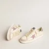 Stardan pour femme en cuir nappa et daim avec étoile pailletée rose et languette au talon
