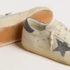 Super-Star avec étoile en cuir couleur crème ornée de cristaux Swarovski et languette de talon en cuir bleu à imprimé lézard