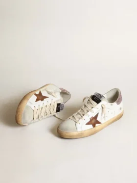Super-Star avec une étoile beige et une languette de talon à paillettes roses