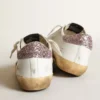 Super-Star avec une étoile beige et une languette de talon à paillettes roses