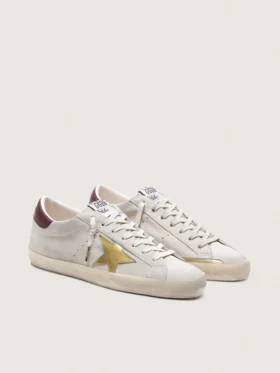 Super-Star CNY pour homme en daim ivoire avec étoile en cuir métallisé et languette de talon en cuir