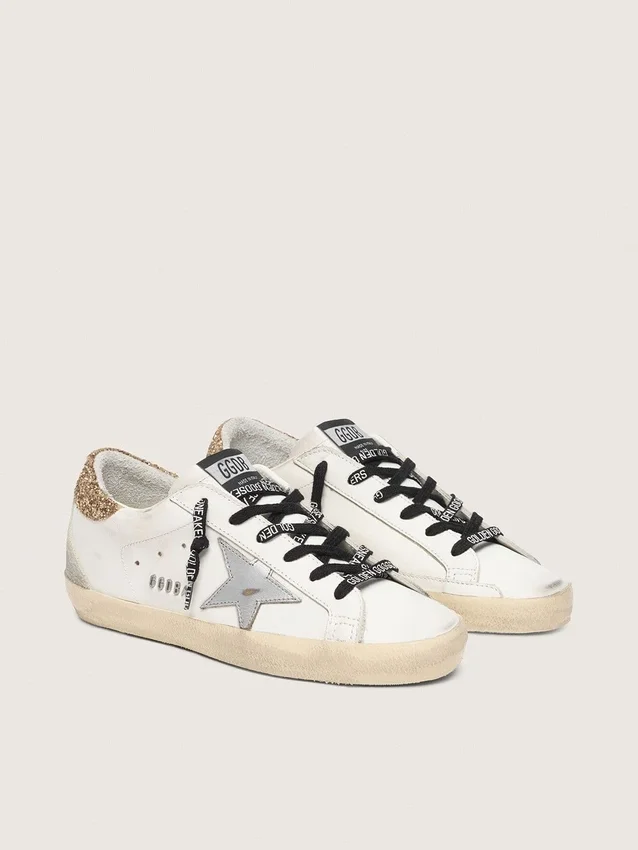 Super-Star en cuir blanc pour femme avec languette de talon pailletée