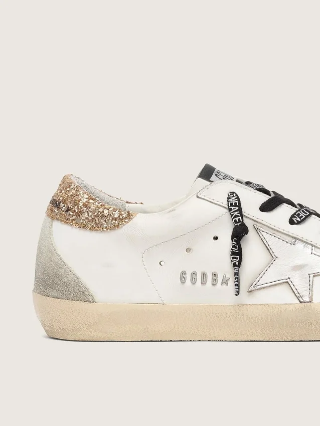 Super-Star en cuir blanc pour femme avec languette de talon pailletée