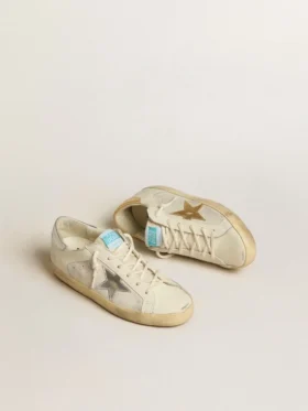Super-Star en cuir et daim blancs avec une étoile en cuir argenté et doré