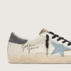 Super-Star en cuir nappa avec étoile en daim bleu clair et languette de talon en cuir gris