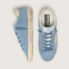 Super-Star en daim bleu clair avec étoile et languette de talon en cuir beige