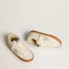 Super-Star en nappa blanc avec étoile en daim et doublure en peau de mouton