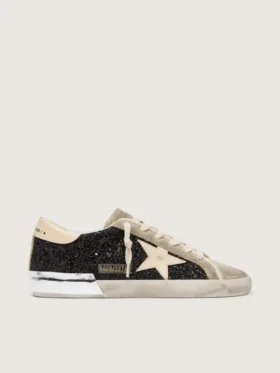 Super-Star en paillettes noires avec étoile crème et empiècements en daim