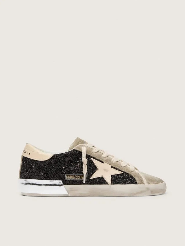 Super-Star en paillettes noires avec étoile crème et empiècements en daim