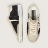 Super-Star en paillettes noires avec étoile crème et empiècements en daim
