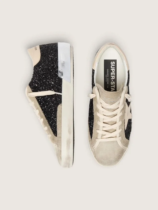 Super-Star en paillettes noires avec étoile crème et empiècements en daim