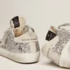 Super-Star Junior avec paillettes argentées et détails en daim