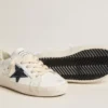 Super-Star Junior en cuir avec étoile pailletée et languette au talon
