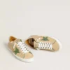 Super-Star LTD en cuir beige avec étoile en daim vert et languette de talon en cuir argenté