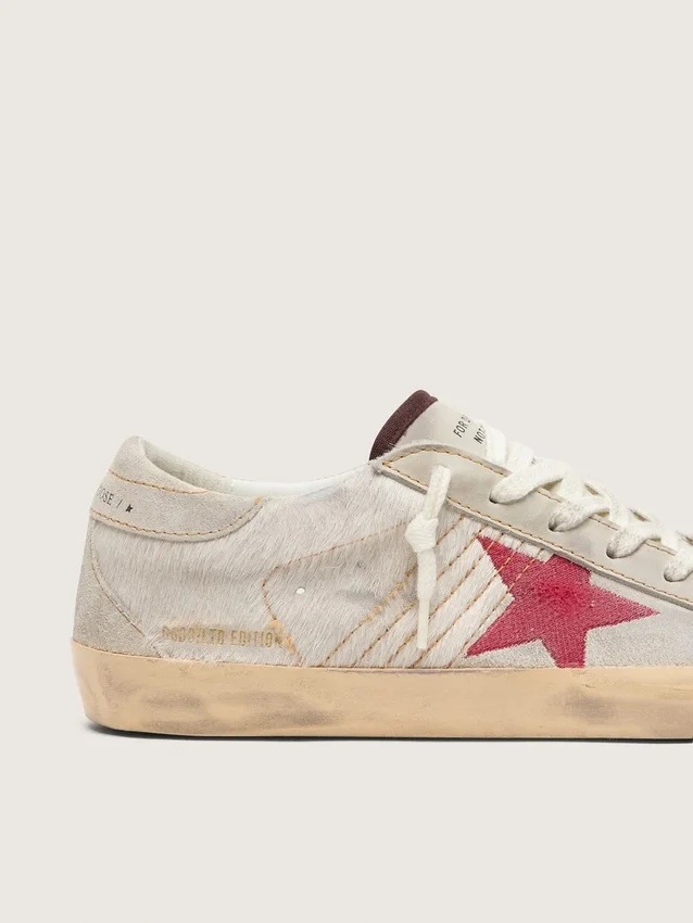 Super-Star LTD pour femme en cuir de poney blanc avec étoile en daim rouge
