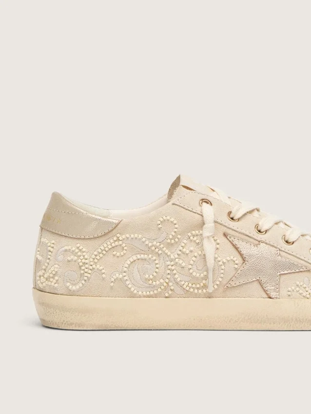 Super-Star LTD pour femme en daim nacré avec étoile dorée et broderie de perles