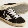Super-Star LTD pour femme en daim noir avec étoile imprimée blanche et languette de talon pailletée argentée